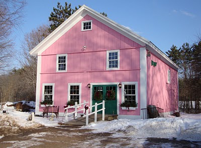 pink barn with white trim